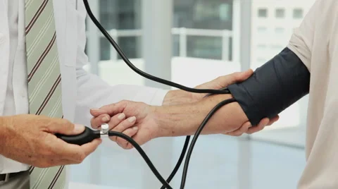 Close Up Shot Of Doctor Checking Blood Pressure Of A Senior Patient Stock Footage