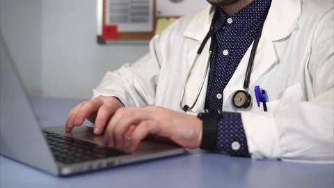 Close up shot of doctor working using laptop. Stock Footage 75466562