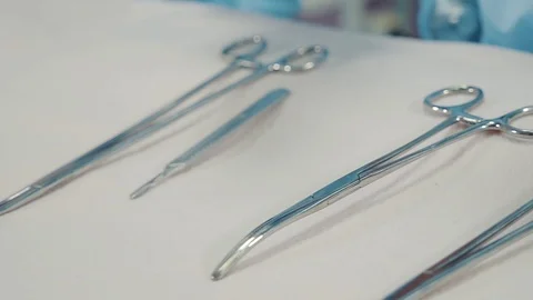 Close up shot of the doctor's hands in gloves, who touches medical instruments Stock-Footage 85794587
