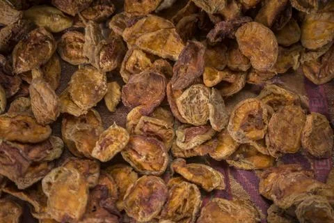 Close-up shot of dried apples on rustic cloth Stock Photos