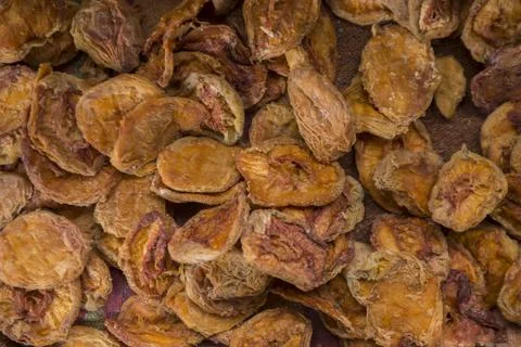Close-up shot of dried apples on rustic cloth Stock Photos