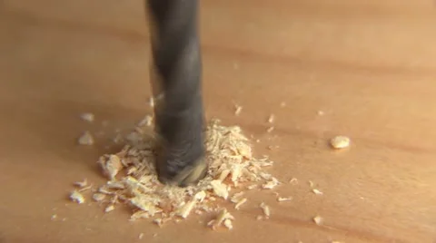 Close up shot of a drill bit going into wood Video stock 63932899