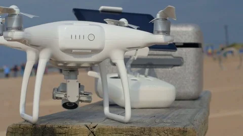 Close up shot of drone before flying on the beach. Video stock 83924397