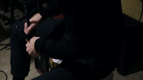 Close up shot of drummer playing live music on cajon with drum brushes Stock Footage 126933904