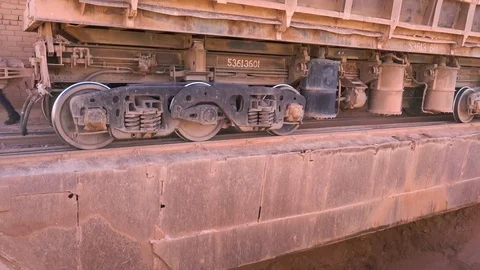 Close-up shot of dump car unloading ore at the crushing and sorting complex Vídeos de archivo 75392565