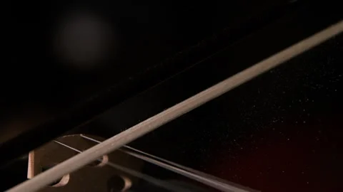 Close up Shot of Dust Debris on a Violin in Slow Motion Stock Footage 270409673