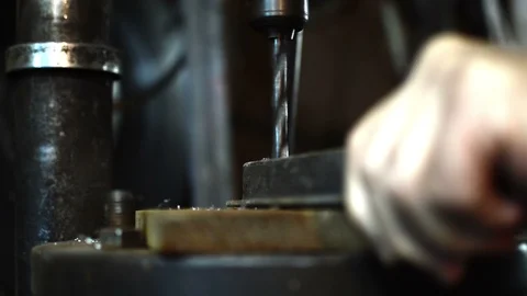 Close up shot electric drill to drilling black stainless steel with  depth of Video stock 109130138