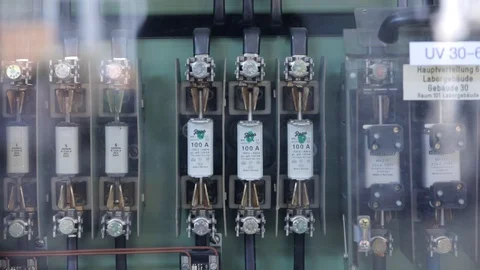 Close shot of a electric safety control panel.	 Stock Footage 129357832