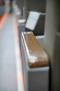 Close-up shot of an elegant wooden pattern armrest on a modern transport Stock Photos