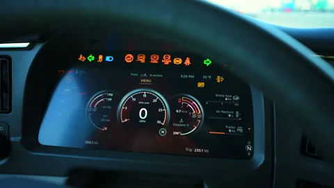 Close up shot of element interior of a new semi truck. turned on engine of Stock Footage 296921295
