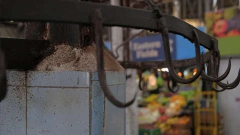 Close up shot of empty meat hooks in a food market Stock-Footage 122641218