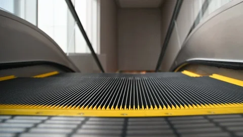 Close-up shot of empty moving  escalator stairs Stock Footage 105387146