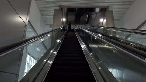 Close-up Shot of Empty Moving Staircase Running up and down Stock Footage 129904182