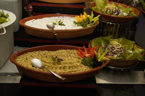 Close-shot of enticing array of dishes at a 5-star hotel iftar buffet in Muscat. Stock Photos