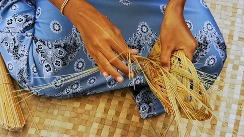 Close up shot of an expert hands weaving rattan basket in Terengganu, Malaysia. Stock Footage 116816684
