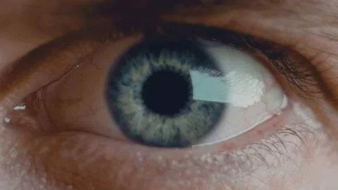 Close up shot of eye opening with beautiful blue iris. Healthy eyesight concept Stock Footage 136474264