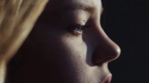 Close up shot face young lonely sensual virgin european blue eyes girl Stock Footage 84643748