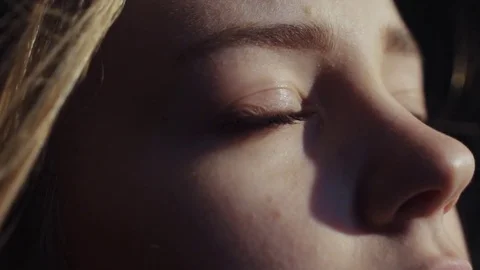 Close up shot face young sensual european girl open blue eyes look brihgt Stock Footage 84643760
