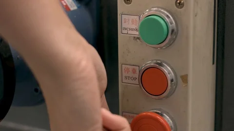 Close up shot of factory worker pushing a plant machinery button. Industrial Stock Footage 86798517