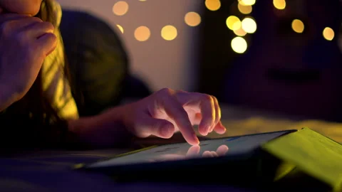 Close up shot of female hand using tablet and touching slide on screen. Stock-Footage 205437382