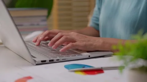 Close up shot of female hand using laptop for working, learning, searching,.. Stock Footage 340307106