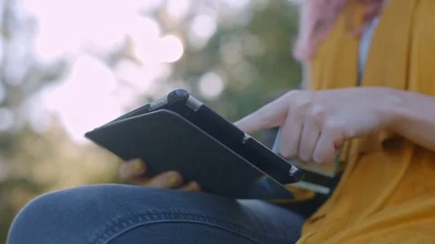 Close up shot of female hands with tablet computer. Woman shopping using tablet Stock Footage 72249338