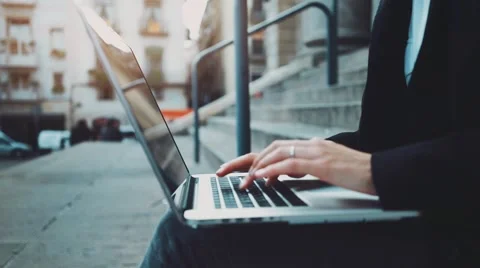 Close-up shot of female hands typing on laptop keyboard Stock Footage
