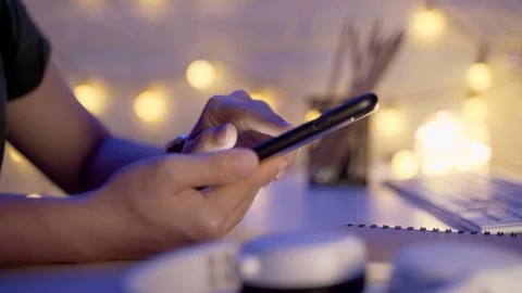 Close up shot of Female hands using smart phone in office at night Stock-Footage 124628542