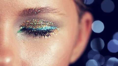 Close-up shot of a festive makeover with sequins Video stock 82736920