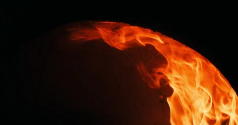 Close-up shot of firewood burning brightly in a stone oven in a restaurant's Stock Footage 247484348