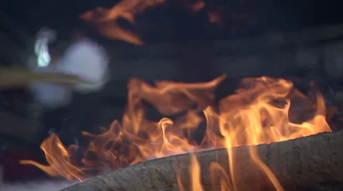 Close shot of flames rising from a camp fire. Stock Footage 46868411