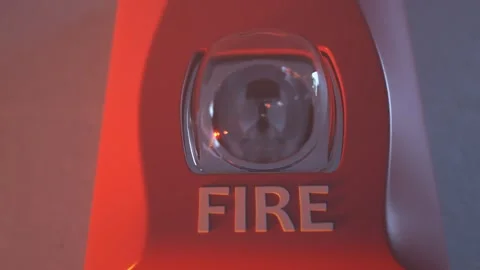 Close up shot of flashing strobe red fire alarm during fire in the room 스톡 동영상 280060218