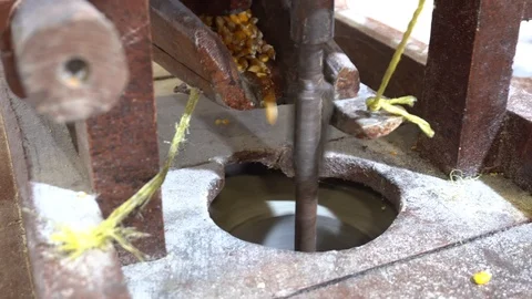 Close Shot Of Flour or Corn Being Processed At Old Fashioned Mill Stock Footage 121875914