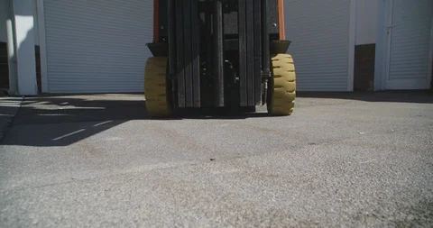 Close up shot, forklift driver loading empty pallet, 4K. Stock Footage 117190529