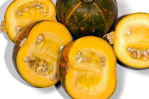 Close Up Shot of Four Yellow Halved Gem Squash on White Stock Photos
