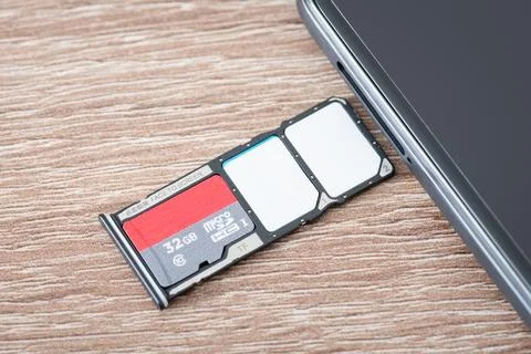 Close up shot of full sim cards tray Stock Photos