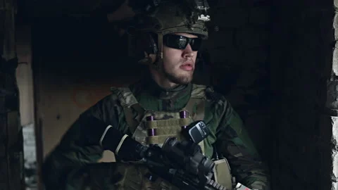 Close-up Shot of Fully Equipped Soldier Standing inside the building Stock Footage 137363281