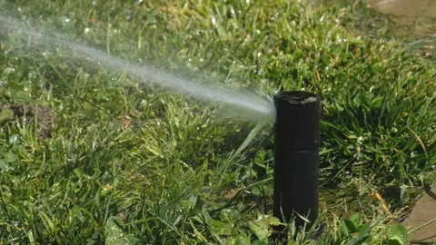 Close Up Shot Of A Garden Sprinker Stock Footage 107052852