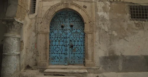 Close Up Shot Of Garnished Old Blue Door in Tunis Stock Footage 61298295