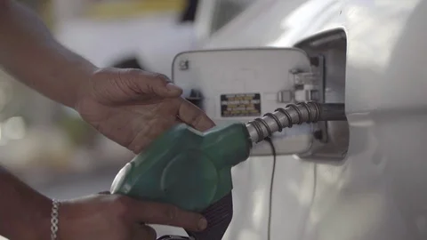 Close shot of a gas pump removed from car tank, slow motion Stock Footage 121877940