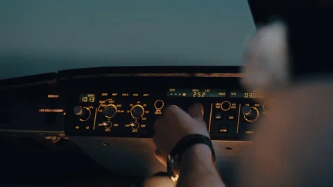 Close shot of glareshield - front panel of modern aircraft with co-pilot's hand  Stock Footage 71801565