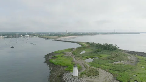 Close up shot going backwards Drone footage of Black Rock Harbor Lighthouse Stock Footage 341890898