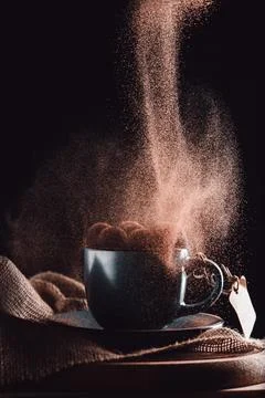Close shot grated chocolate falling Stock Photos