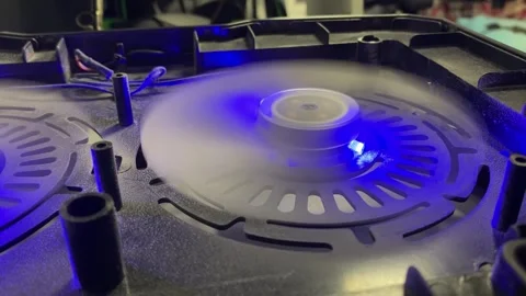 A close-up shot of the gray plastic blades of a cooling fan inside a laptop.. 스톡 동영상 323213746