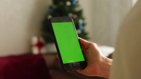 Close-up shot of green screen template smartphone in female hands Stock Footage 164584205