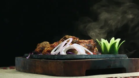 Close-Up Shot Grilled Chicken BBQ on Round Table Black Background Stock Footage 200954732