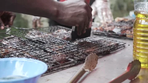 Close up shot of grilled fish on an open grill Video stock 283872418