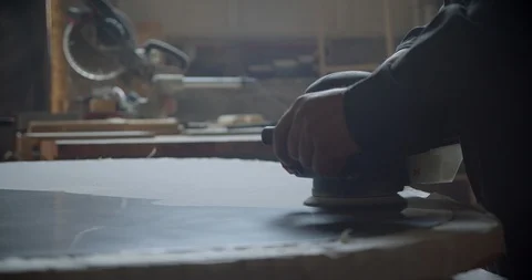 Close-up shot of grinding machine polishing the wooden board at wood factory. Video stock 112196194