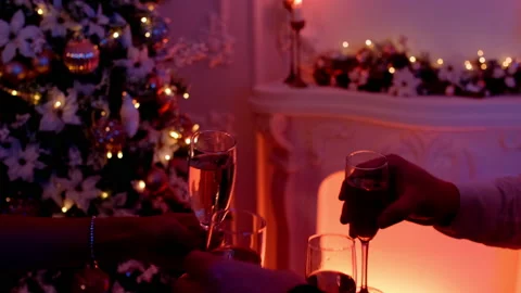 Close up shot of a group of people toasting glasses filled with champagne Stock Footage 222100636