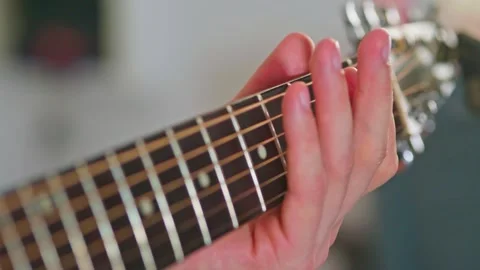 Close-up shot of guitar playing Stock Footage 255128098